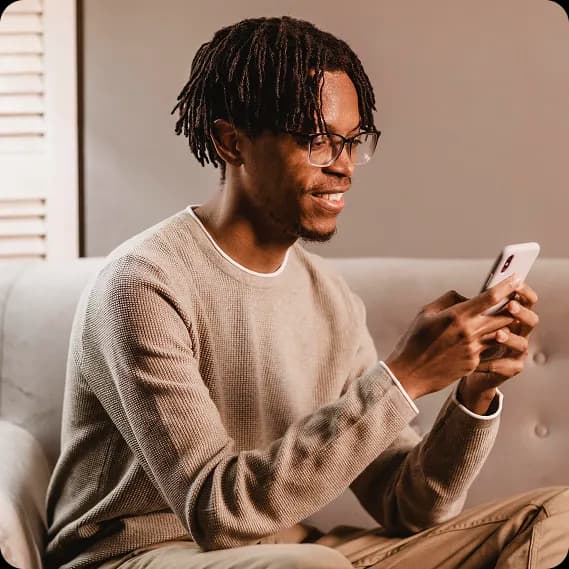 Person using phone for insurance